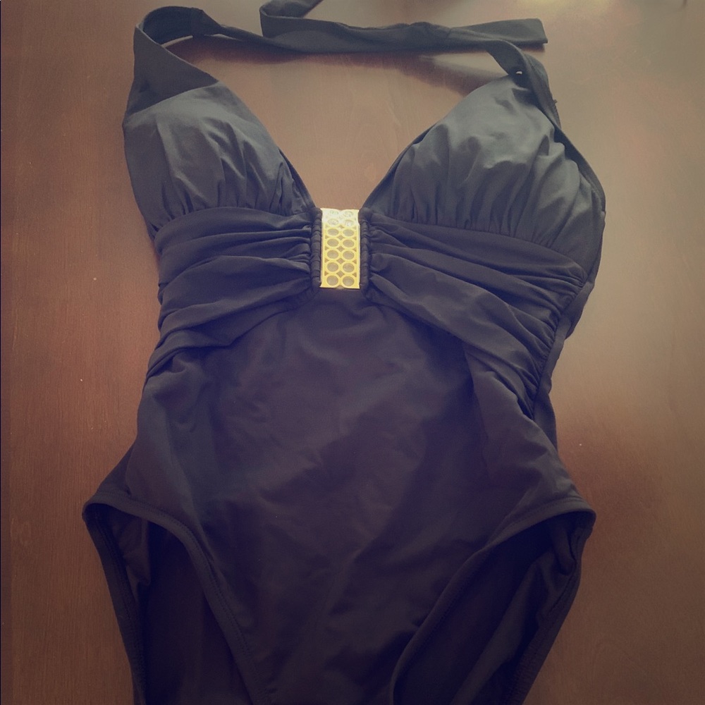 Never worn one piece black bathing suit... size 6